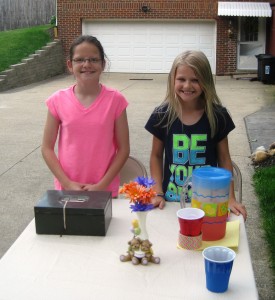 The girls running the lemonade stand.