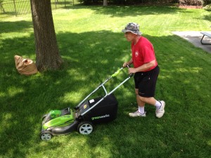 Tom mowing at John and Jackie's